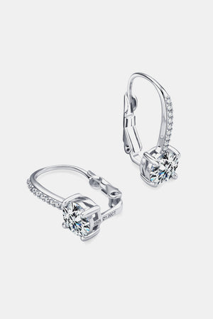 Silver pavé-set moissanite leverback earrings with a round-cut center stone.