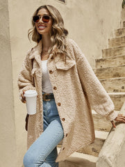 Oversized teddy bear shacket in tan with button-down front and chest pockets.