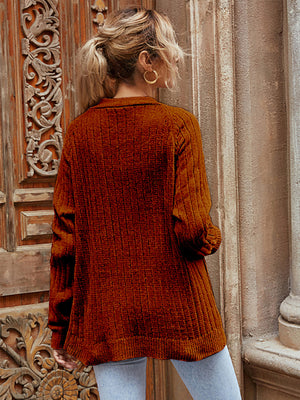 Textured pocket cardigan in brown with ribbed detail and collar.