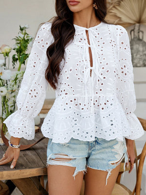 White eyelet peplum blouse with tie neck and ruffled sleeves