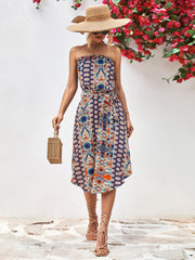 Printed bandeau midi dress in dark blue with asymmetric hem and belt.