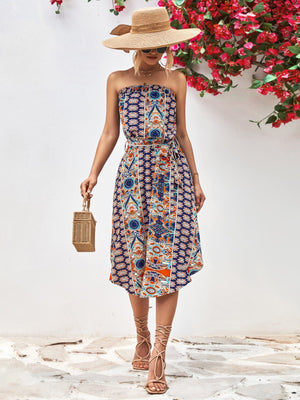 Printed bandeau midi dress in dark blue with asymmetric hem and belt.
