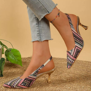 Geometric patterned slingback kitten heels in multicolor with a pointed toe and gold heel.