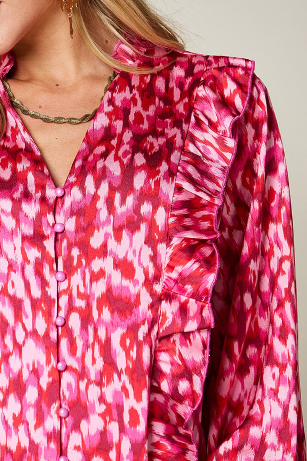 Hot Pink abstract print blouse with ruffle front and button detail