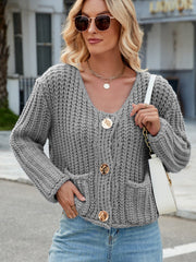 Gray chunky knit cardigan with gold buttons and pockets