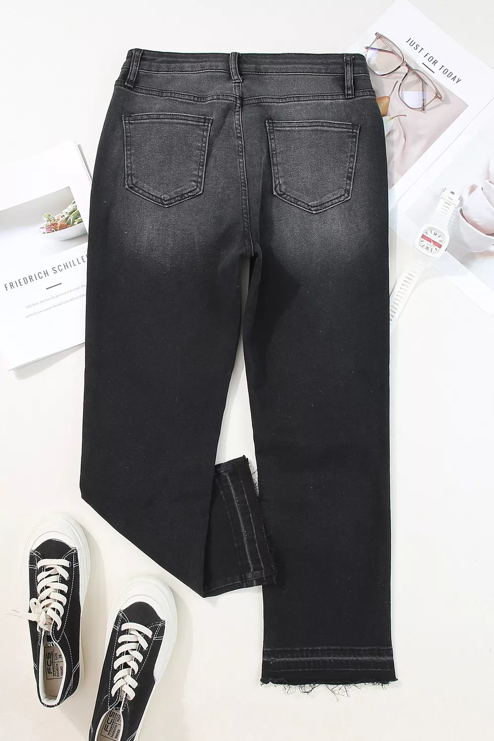 Charcoal washed denim maternity jeans with distressed hem detail.