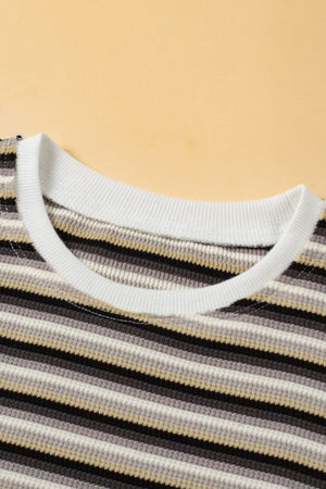 Rainbow stripe cotton jumpsuit with crew neck and ribbed trim