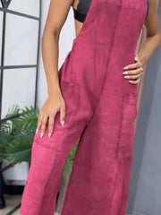 Rose red vintage wash wide-leg denim overalls with bib front and patch pockets.