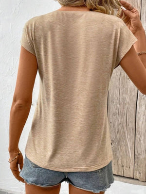 Tan cap sleeve slouchy v-neck tee with a casual fit.