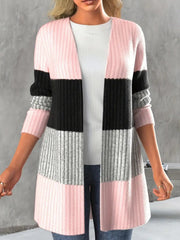 Monochrome block ribbed cardigan in pink, black, and grey stripes.