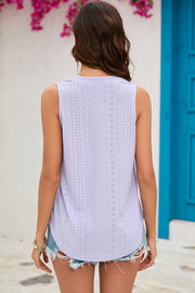 Lavender perforated V-neck sleeveless blouse with eyelet details.