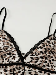 Leopard print cami top with black lace trim and adjustable straps.