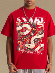 Red oversized graphic tee with snake and floral print, "SNAKE" and "Favorite Day" text.