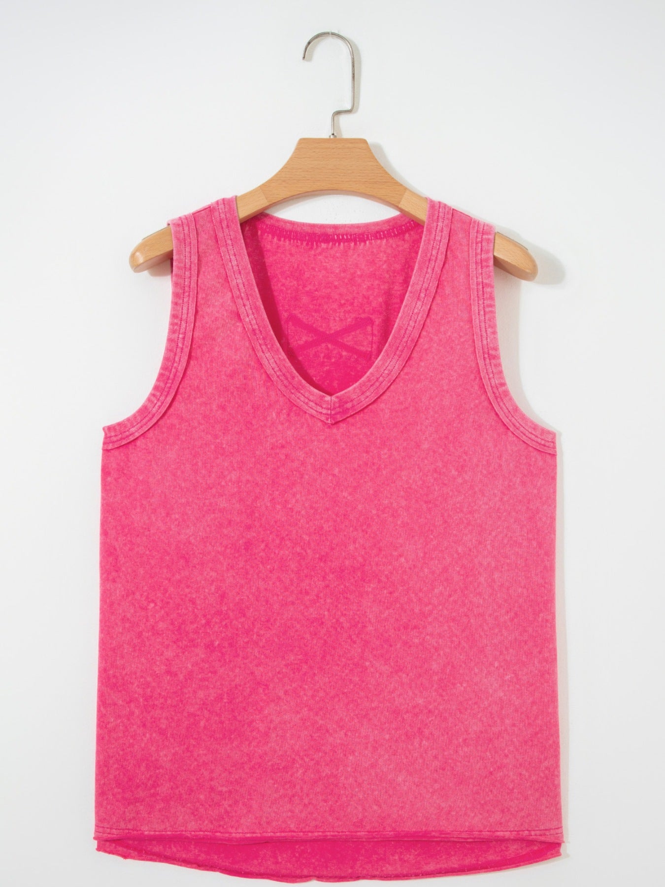 Textured cotton v-neck tank top in bright pink with a subtle X detail inside the neckline.