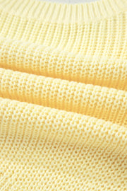 Yellow knit sweater vest with a textured stitch detail.