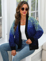 Speckled gradient knit cardigan in navy with black trim and buttons.