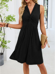 Black sleeveless casual dress with twist knot front and A-line skirt.