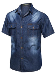 Men's dark wash denim short sleeve shirt with button-down front and chest pockets.
