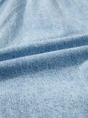 Light wash denim shorts with frayed edges and drawstring detail