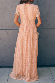 Peach lace midi dress with short sleeves and scalloped hem.