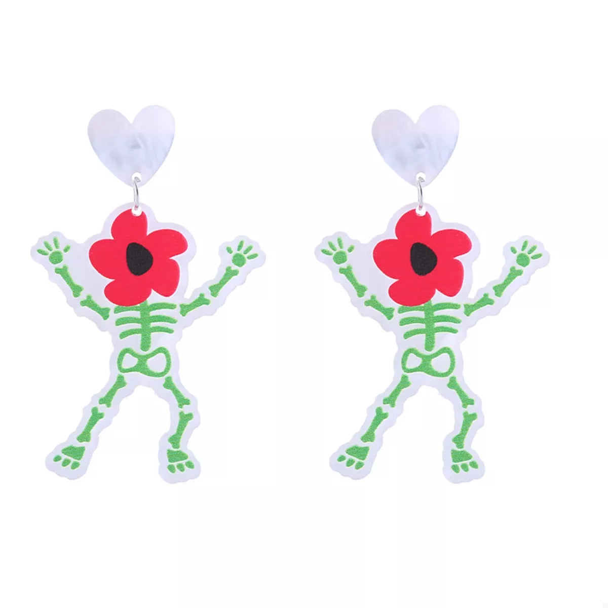 Spooky skeleton dangle earrings with red flower heads and white heart tops.