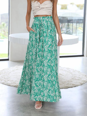 Green floral print palazzo trousers with pockets, cinched waist and wide leg