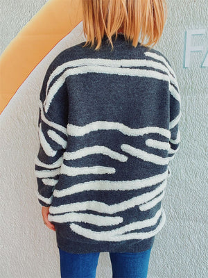 Textured stripe knit crewneck sweater in dark gray with white fuzzy stripes.