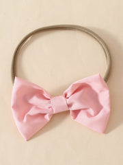 Pink bow headband for baby girl with soft elastic band