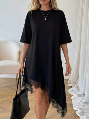 Black asymmetrical t-shirt dress with lace trim hem and short sleeves.