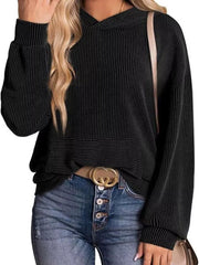 Black ribbed V-neck oversized hoodie with balloon sleeves and a kangaroo pocket.
