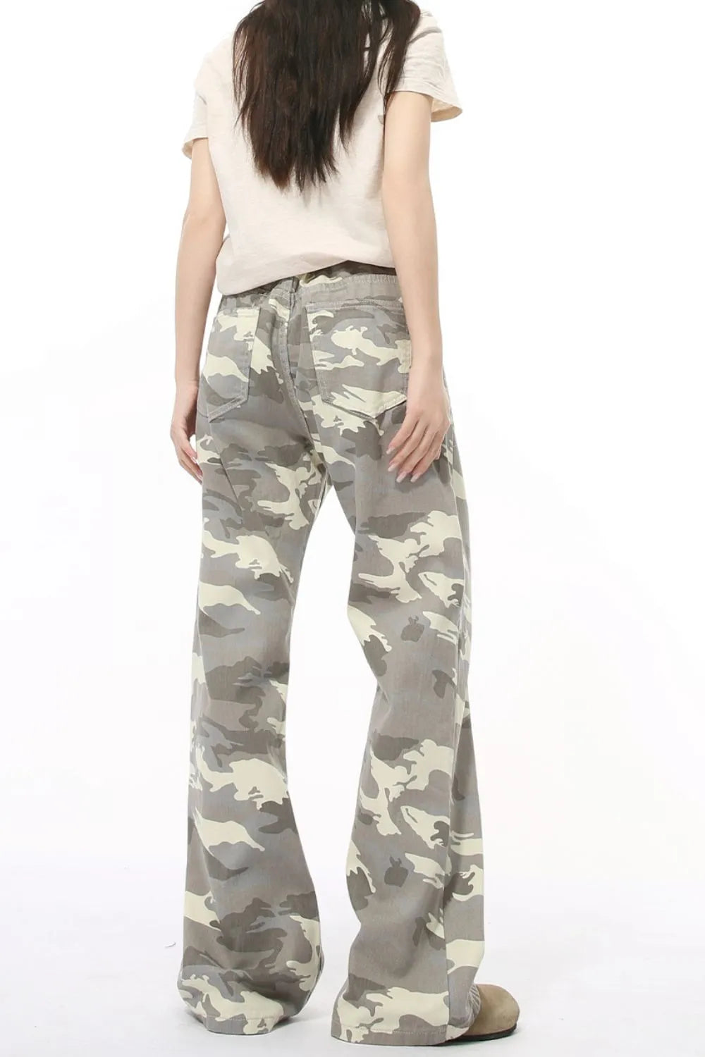 Gray camo flare jeans with utility pockets and a relaxed fit.