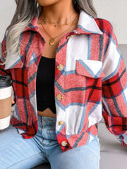 Boxy red plaid shacket with gathered hem, button front, and collarless neckline.