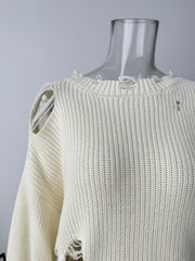 Off white distressed cotton sweater with ripped details and frayed neckline.