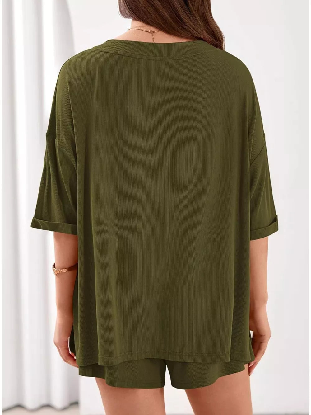 Olive green ribbed V-neck loungewear set with cuffed short sleeves and matching shorts.