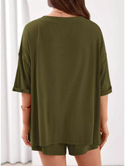 Olive green ribbed V-neck loungewear set with cuffed short sleeves and matching shorts.