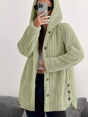Green button-up fleece jacket with hood and textured fabric.
