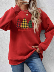 Red crewneck sweatshirt with plaid Christmas trees graphic and Merry Christmas text.