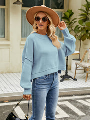 Dropped shoulder knit sweater in Misty Blue with balloon sleeves and crew neck.