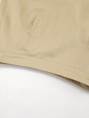 High-waisted A-line skirt in beige cotton with visible stitching detail.