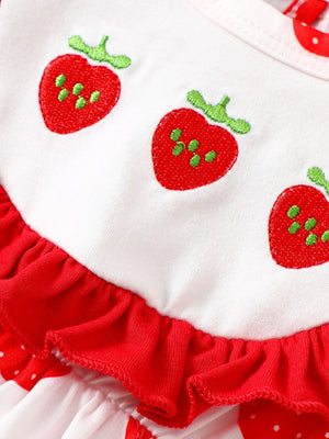 Strawberry floral ruffle one-piece set in white cotton with red strawberry embroidery and red ruffles.