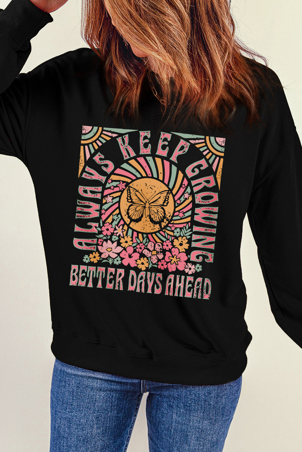 Black crewneck sweatshirt with "Always Keep Growing Better Days Ahead" graphic and butterfly.