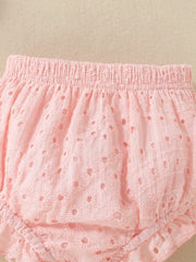 Pink embroidered lace baby shorts with elastic waistband and ruffled hem