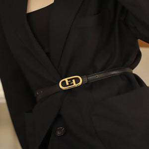 Black cowhide leather belt with oval gold buckle detail