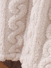Cozy textured pea coat in eggshell with a plush, fuzzy finish and cable knit detail.