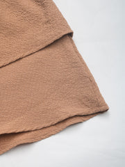 Camel tiered ruffle waistband shorts with textured fabric detail