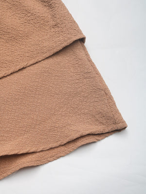 Camel tiered ruffle waistband shorts with textured fabric detail