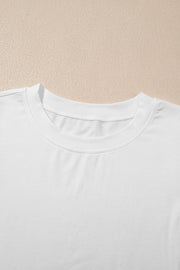 White cotton t-shirt with crew neck and visible lace inset detail on sleeve.