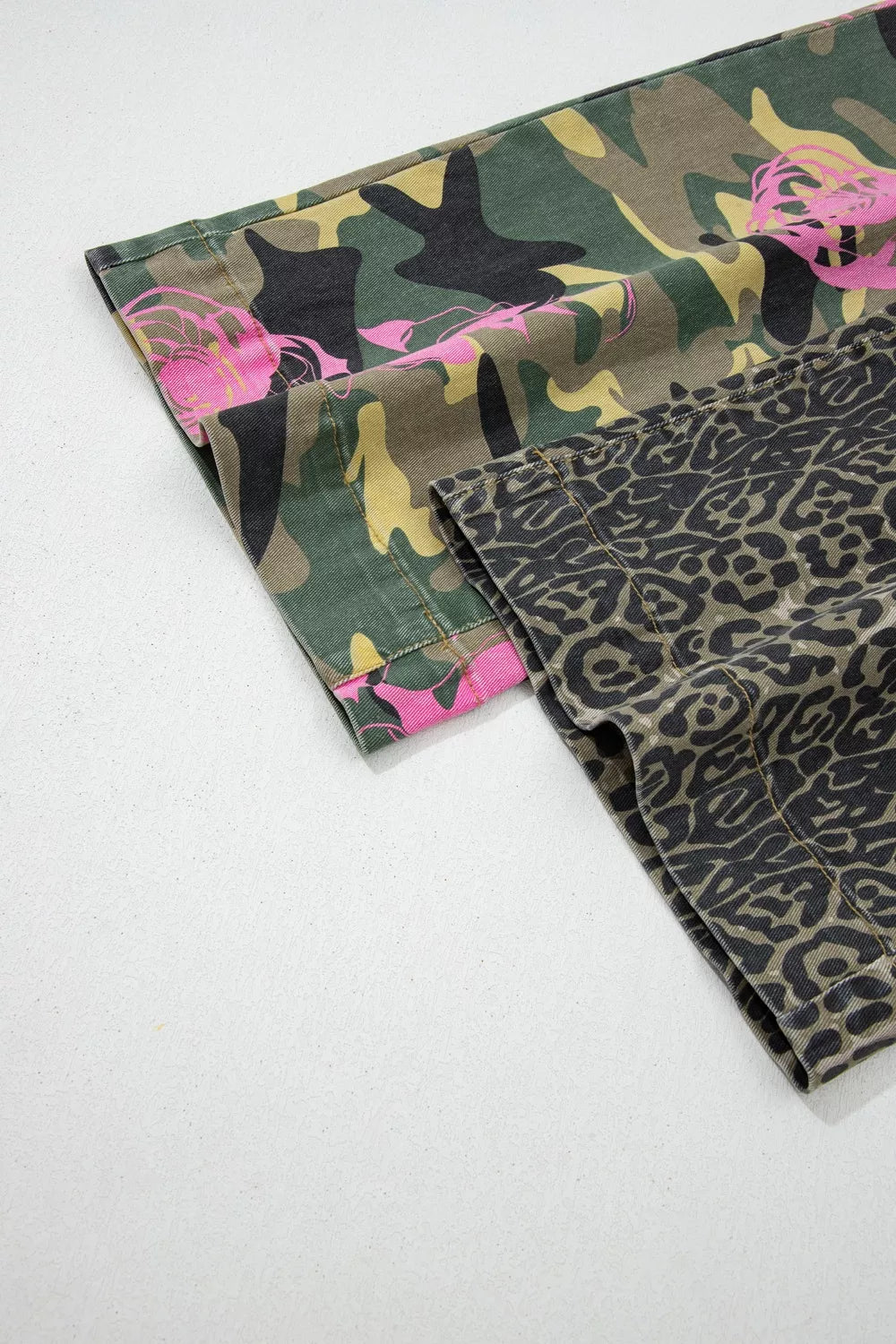 Contrast patchwork jeans with camouflage and leopard print, featuring pink floral accents.