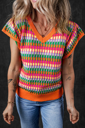 Geometric knit flutter sleeve top in multicolor with orange trim, V-neck, and casual fit.
