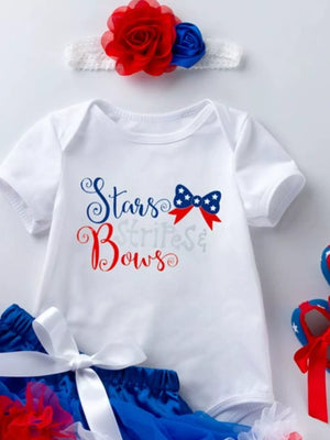 White baby onesie with "Stars Stripes & Bows" text and patriotic bow detail.